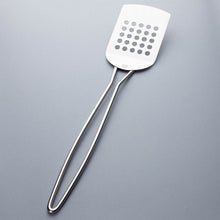 Perforated Turner with Bowed Wire Handle